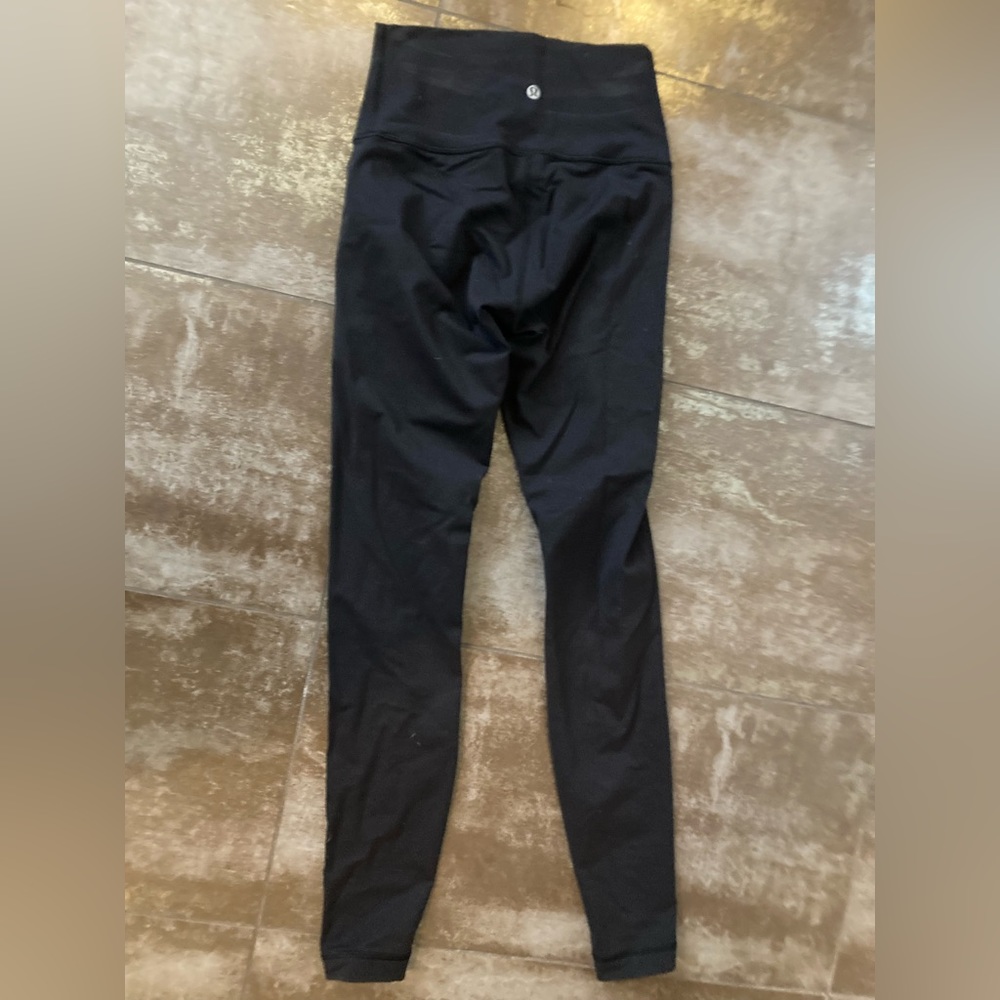 Full length black Lululemon tights size 4 wunder under tights 28”.